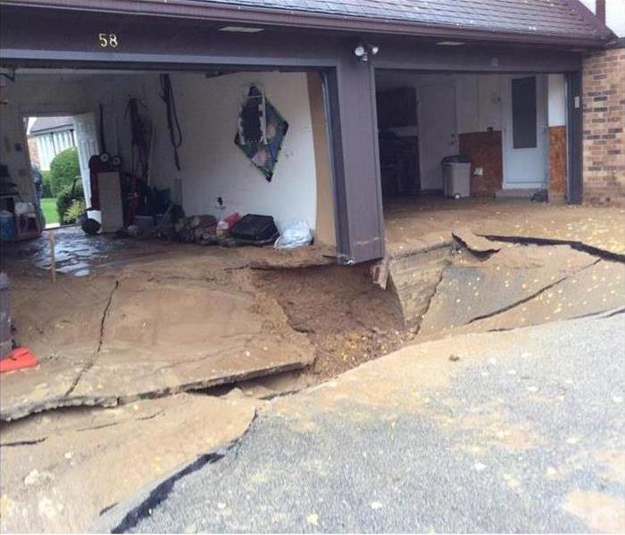 picture of a driveway sunken in 