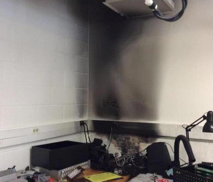 picture of a room with soot covering the wall
