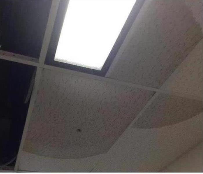 picture of a ceiling with water stains on it