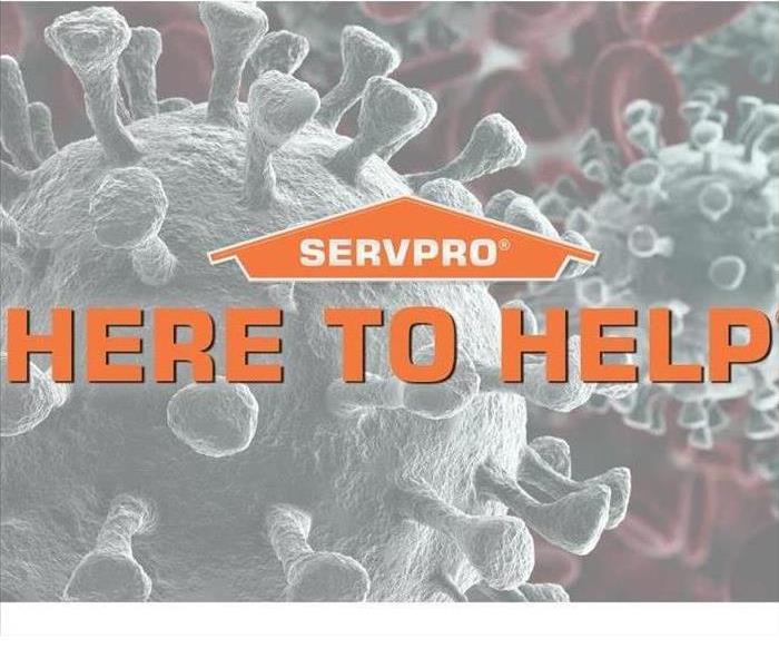 picture of a SERVPRO ad saying Here to Help 