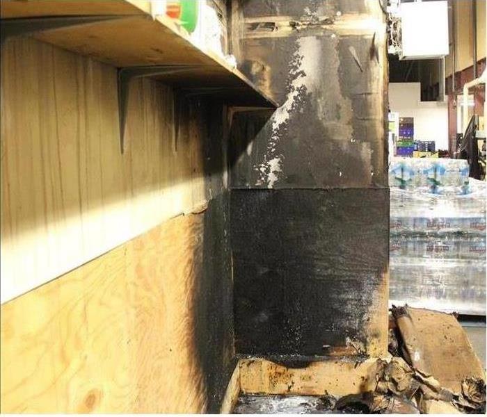 picture of a wall with black soot covering it